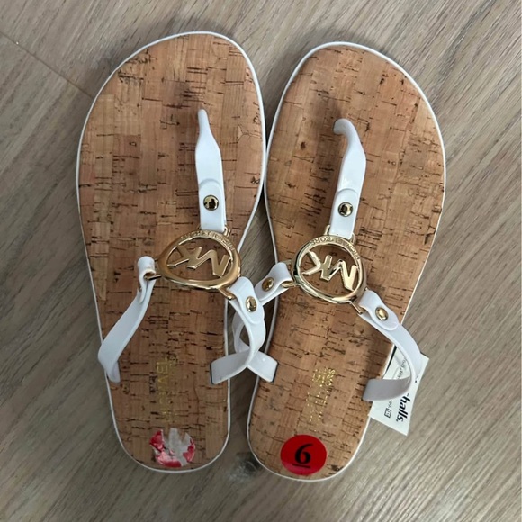 Michael Kors Shoes - Michael Kors Elegant white with gold accents Sandals Flip Flops MK 6